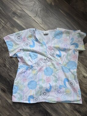 White Swan Floral Scrub Top in White with Blue & Pastel Flowers